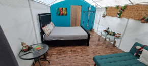 Garza del Sol Glamping Río Celeste Bromelia